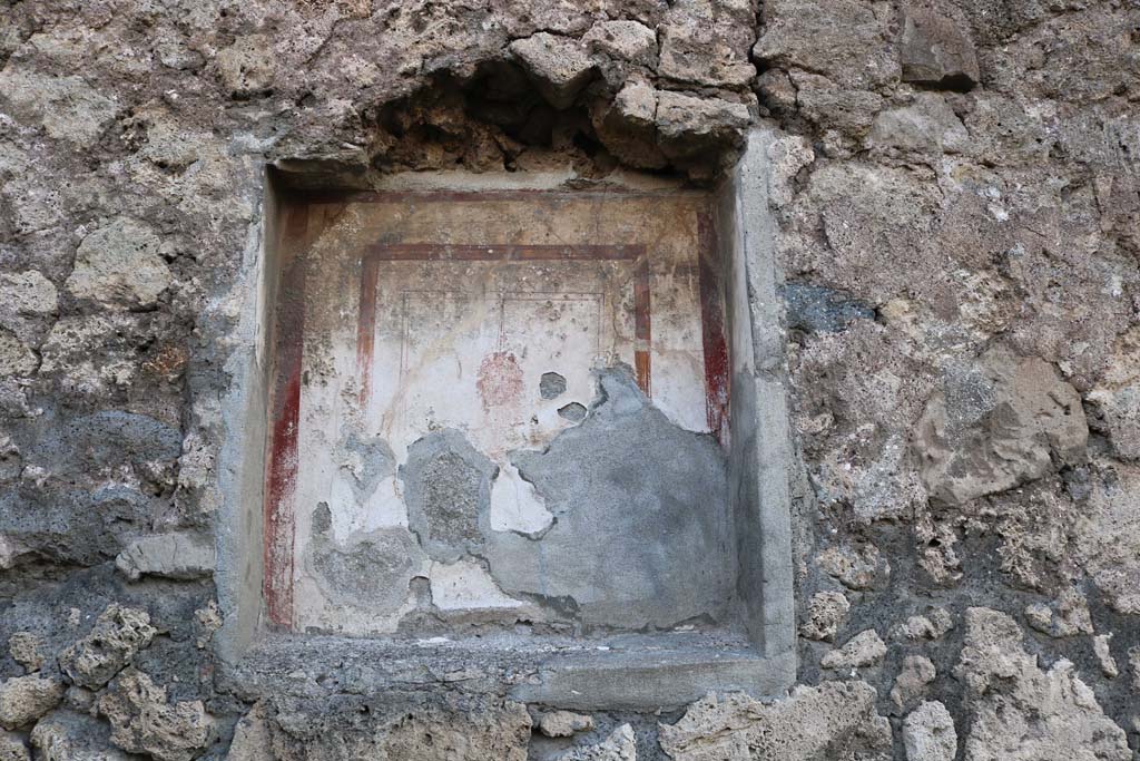 VI.7.9 Pompeii. December 2018. 
Niche on west wall in south ala, with head of the Gorgon. Photo courtesy of Aude Durand.
