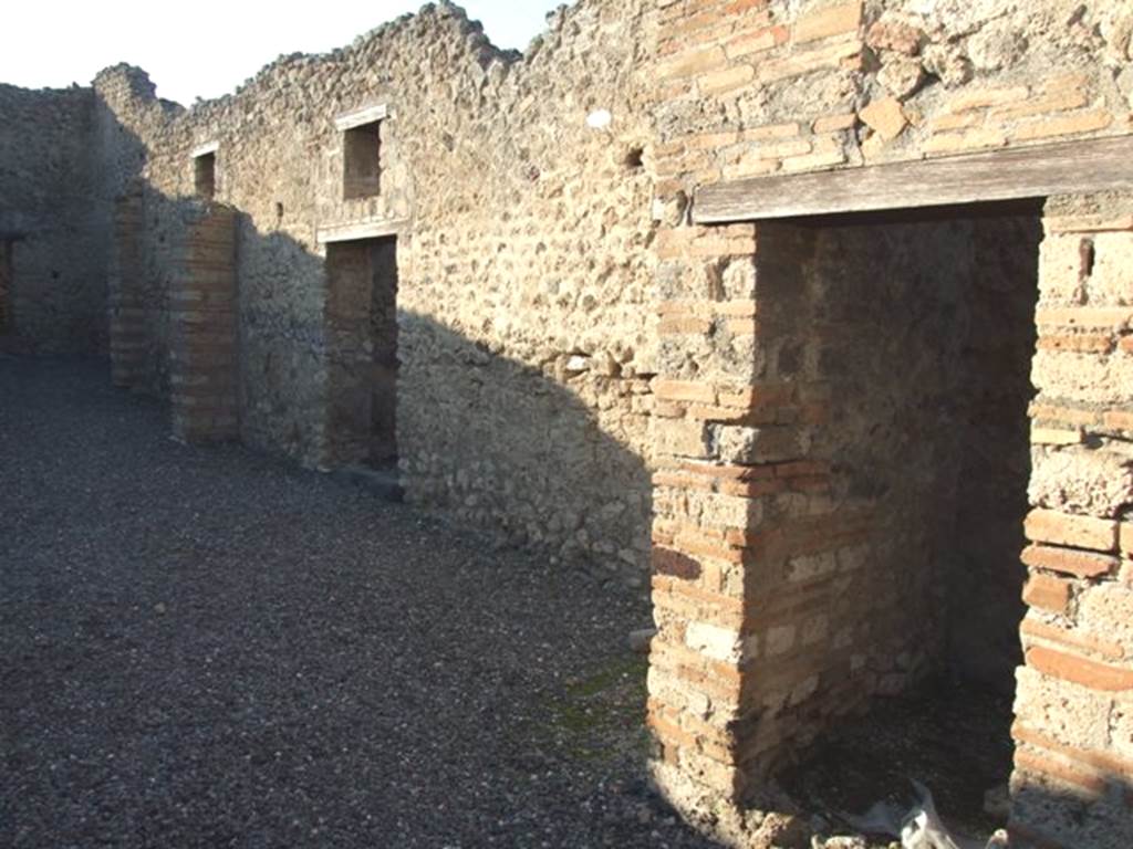 VI.7.15 Pompeii. December 2007. North side from entrance doorway. 
According to Fiorelli, Eschebach and Hobson, on the right, is the doorway into the latrine. See Pappalardo, U., 2001. La Descrizione di Pompei per Giuseppe Fiorelli (1875). Napoli: Massa Editore. (p.58)
See Eschebach, L., 1993. Gebäudeverzeichnis und Stadtplan der antiken Stadt Pompeji. Köln: Böhlau. (p.179) See Hobson, B. 2009. Pompeii, Latrines and Down Pipes. Oxford, Hadrian Books, (p.227) According to Hobson, in this latrine there is one support and one slot, which enabled a latrine to be identified. See Hobson, B., 2009. Latrinae et foricae: Toilets in the Roman World. London; Duckworth. (p.49, and fig 65).
