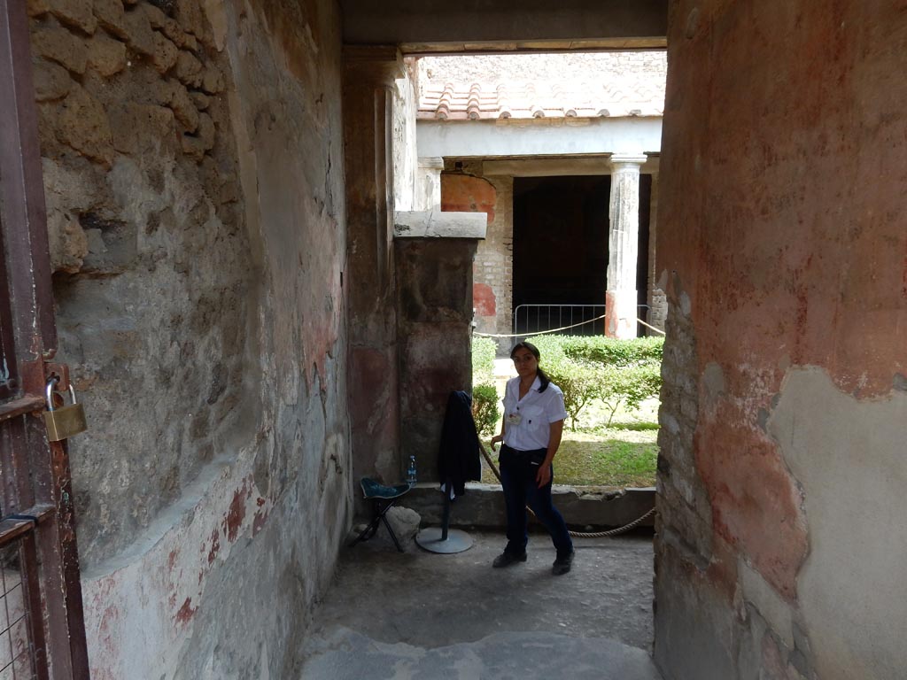 VI.8.3/5 Pompeii. May 2015. Looking east along entrance corridor towards peristyle garden. Photo courtesy of Buzz Ferebee.