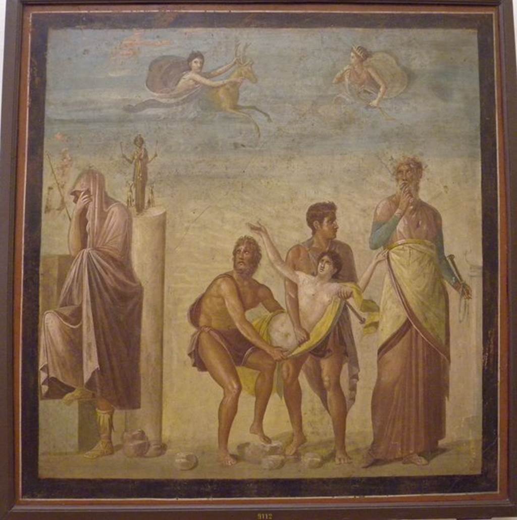 VI.8.3 Pompeii.  Found on 30th April 1825.  North wall of peristyle.  
Painting of the Sacrifice of Iphigenia.  Agamemnon is to the left with a statue of Artemis on a pillar behind.  Two men, perhaps Ulysses and Diomedes, carry Iphigenia to be sacrificed.  Calchas is to the right with his unsheathed sword in his hand. Just as the girl is about to be sacrificed Artemis appears in the sky to the right and from the left a nymph brings a deer which the goddess accepts as a substitute. Now in Naples Archaeological Museum. Inventory number 9112. See Mau, A., 1907, translated by Kelsey F. W. Pompeii: Its Life and Art. New York: Macmillan.  (p.318).  See Helbig, W., 1868. Wandgemälde der vom Vesuv verschütteten Städte Campaniens. Leipzig: Breitkopf und Härtel.  (1304,  p.283-4).  See Gell, W, 1837.  Pompeiana.  London: Lewis A. Lewis.  (Ch 8, T. XXXV).