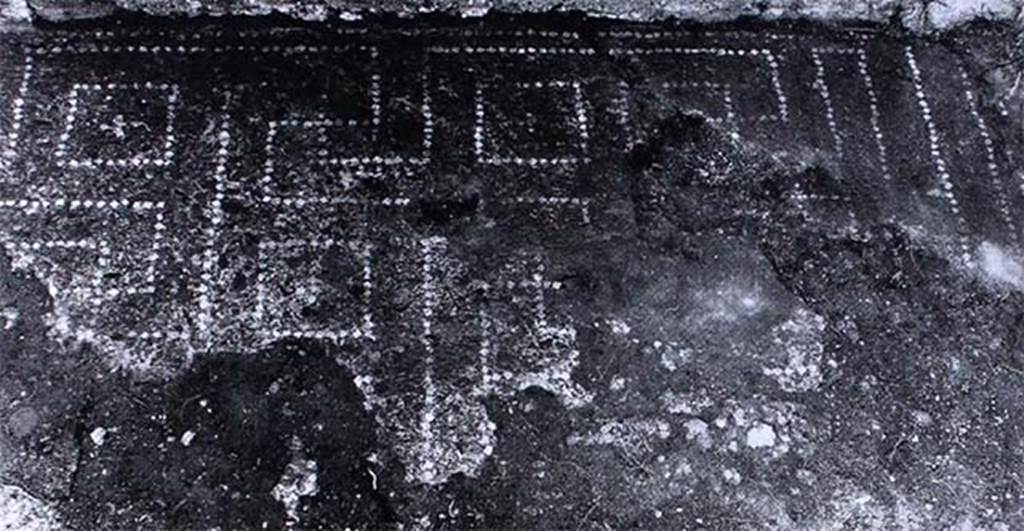 VI.9.2 Pompeii. Floor of room 13, cubiculum on south side of atrium.
According to PPM, the floor was of cocciopesto with a decoration outlined with white tesserae which showed a net design of meanders and swastikas alternating with squares with small crosses in the centres.
