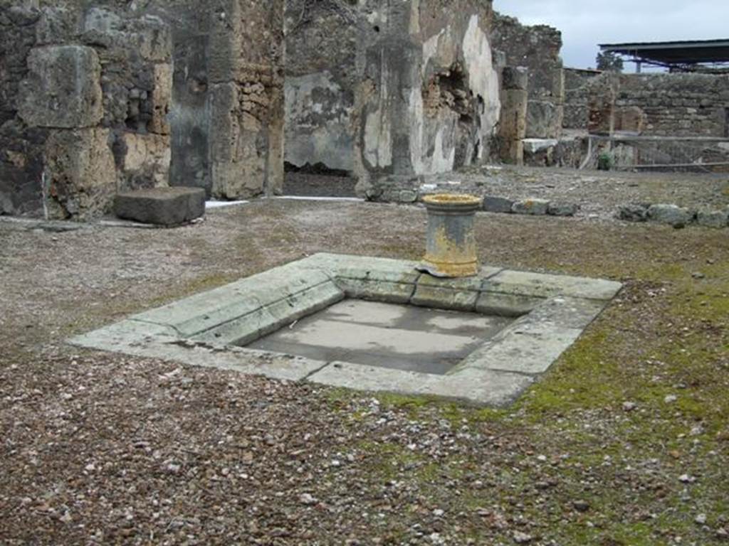 VI.10.7 Pompeii. March 2009. Room 1, looking north-east across impluvium in atrium.  