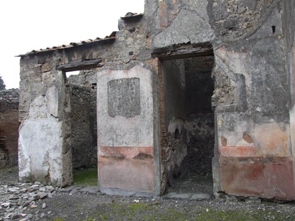 VI.10.11 Pompeii. March 2009. Room 3, east wall of atrium.
According to Pagano and Prisciandaro, in September 1825 found on the right wall of the atrium painted in black letters was –
M(arcum) C(errinium) V(atiam) aed(ilem)
d(ignum) r(ei) p(ublicae) o(ro) v(os) f(aciatis)    [CIL IV 150]
See Pagano, M. and Prisciandaro, R., 2006. Studio sulle provenienze degli oggetti rinvenuti negli scavi borbonici del regno di Napoli.  Naples : Nicola Longobardi. (p.133)  PAH II, 139-40; III, 63,64.
