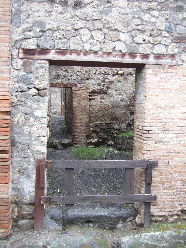 VI.13.12 Pompeii. December 2005. Entrance doorway, looking west.
