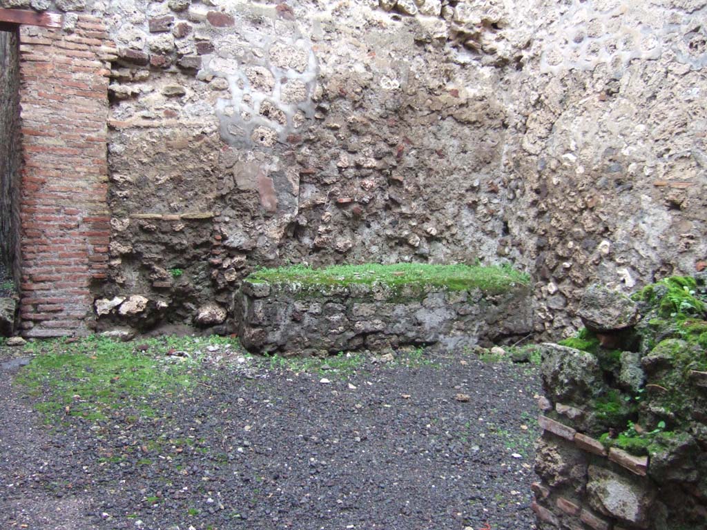 VI.13.12 Pompeii. December 2005. 
Looking north-west across room formerly linked to kitchen area by means of the blocked doorway.
