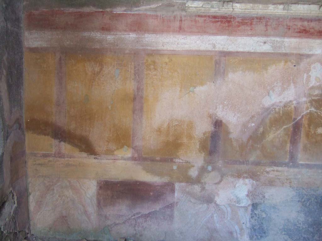 VI.13.19 Pompeii. September 2005. Cubiculum on the north side of atrium, painted wall decoration on west wall.