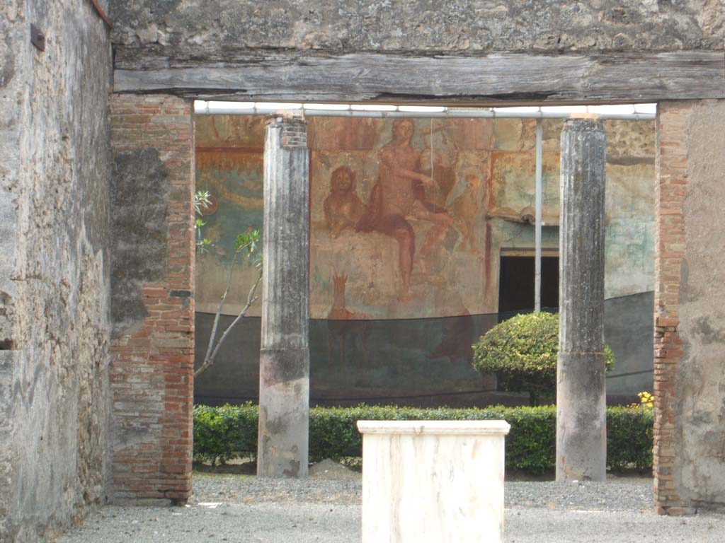 VI.14.20 Pompeii. May 2005. Looking through tablinum to peristyle and west wall with painting of Orpheus.