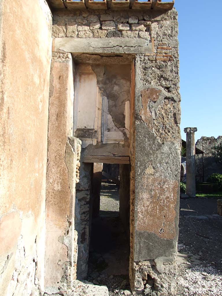 VI.14.43 Pompeii. December 2007.  
Room 6, west end of corridor in atrium, leading east to rear of house with preserved outline of doors above. 

