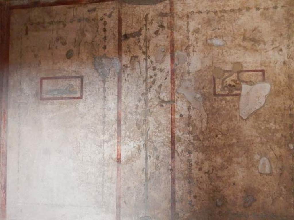 VI.15.1 Pompeii. May 2017. Painted panels on east wall. Photo courtesy of Buzz Ferebee.

