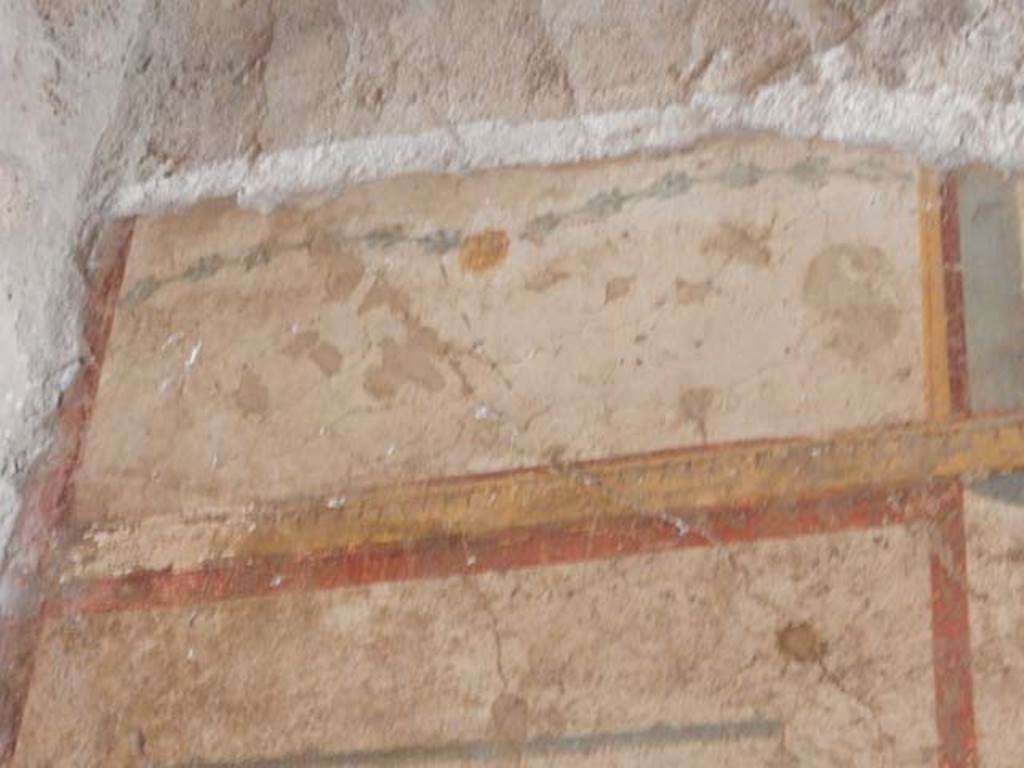 VI.15.1 Pompeii. May 2017. Painted decoration from south end of west wall.
Photo courtesy of Buzz Ferebee.
