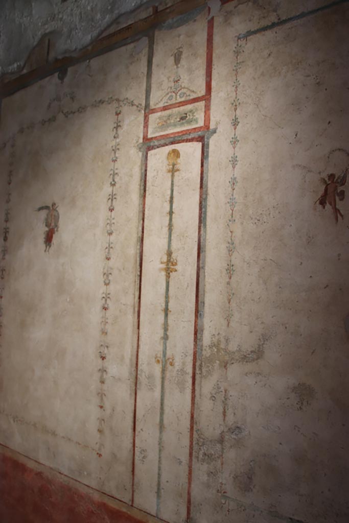 VI.15. I Pompeii. October 2023. 
Panel with painted candelabra on west wall. Photo courtesy of Klaus Heese.
