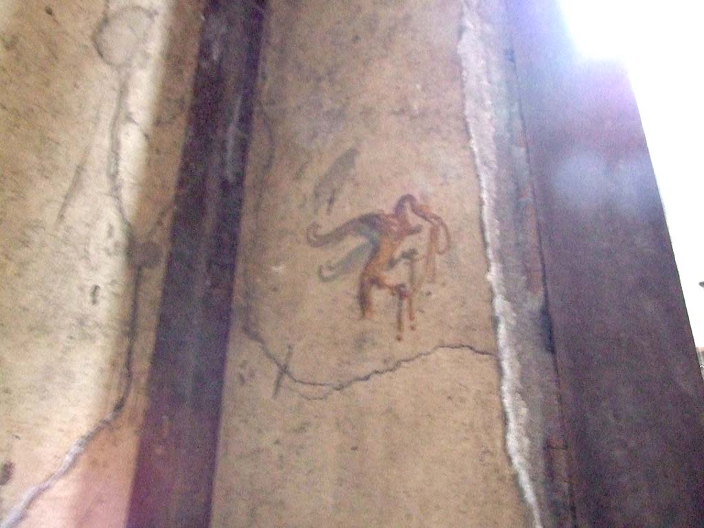 VI.15.1 Pompeii. December 2006. Detail of painted figure on north wall in north-west corner of bedroom to the south of atrium.