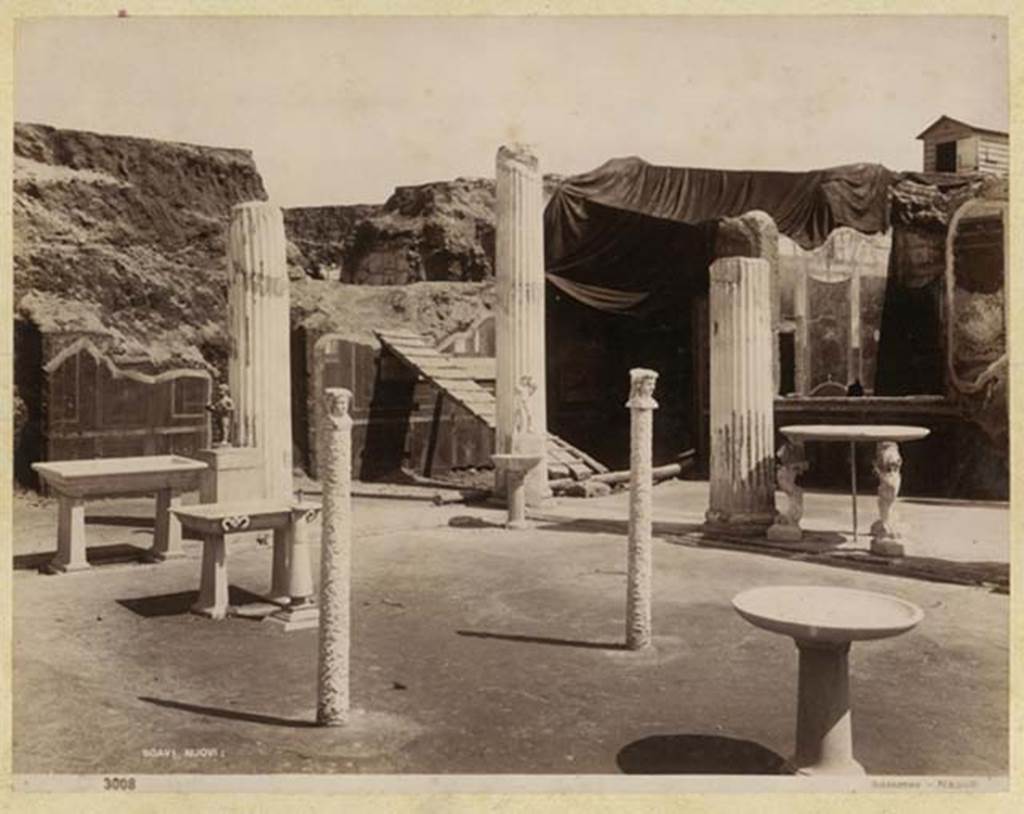 VI.15.1 Pompeii. Photo by G Sommer no. 3008, possibly 1894-95 during excavations. 
Looking north-east across peristyle garden showing ornaments in place. Photo courtesy of Rick Bauer.

