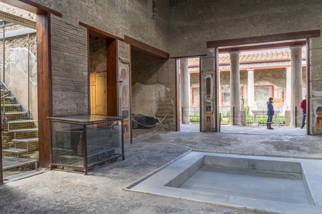 VI.15.1 Pompeii. March 2023. Looking south-west across impluvium in atrium towards peristyle. Photo courtesy of Johannes Eber.