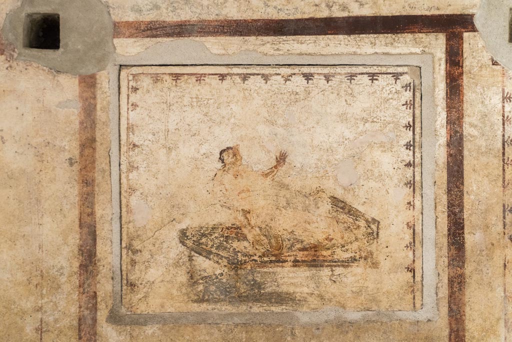 VI.15.1 Pompeii. March 2023. 
Erotic painting in bedroom, used either by servants or as a private brothel? Photo courtesy of Johannes Eber.
