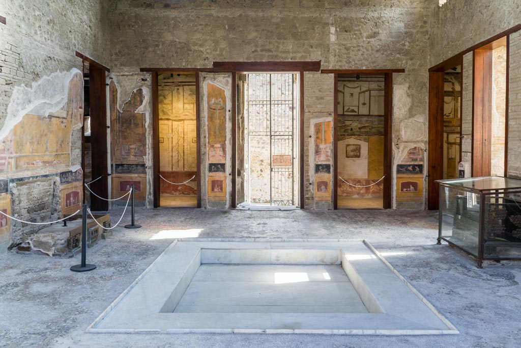 VI.15.1 Pompeii. March 2023. Looking east across atrium towards entrance doorway, in centre. Photo courtesy of Johannes Eber.