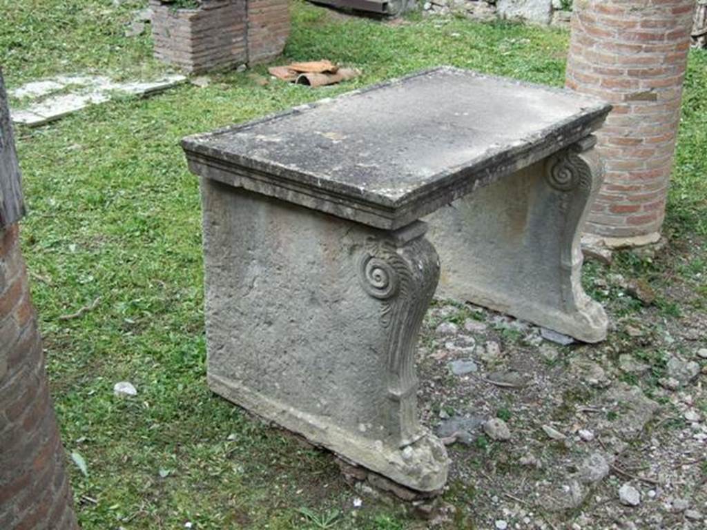 VI.15.6 Pompeii. March 2009. Room 1, south side of table near impluvium.  