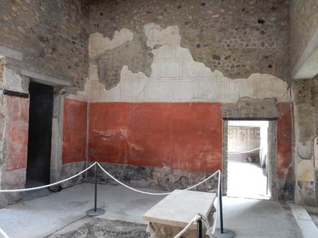 VI.15.8 Pompeii. May 2015. Looking towards south wall of atrium with doorway to portico. Photo courtesy of Buzz Ferebee.
