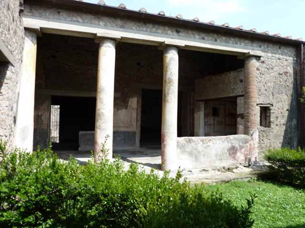 VI.15.8 Pompeii. May 2010. Looking south-east across garden to portico.