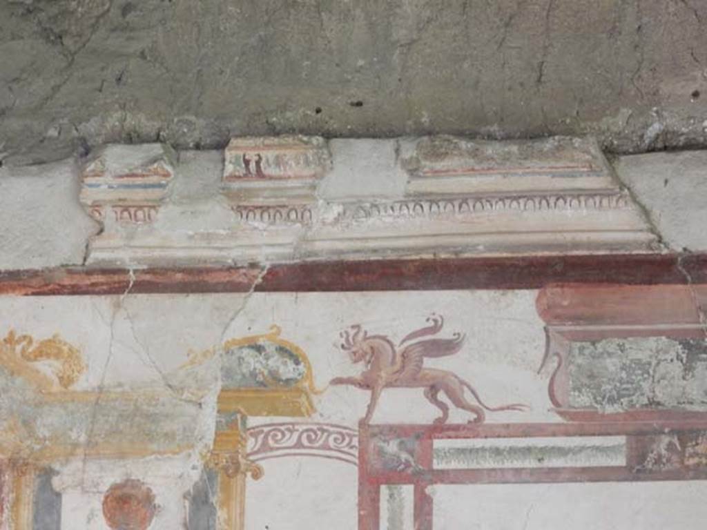 VI.15.8 Pompeii. May 2015. Detail of stucco on upper east side of centre of south wall.  Photo courtesy of Buzz Ferebee.
