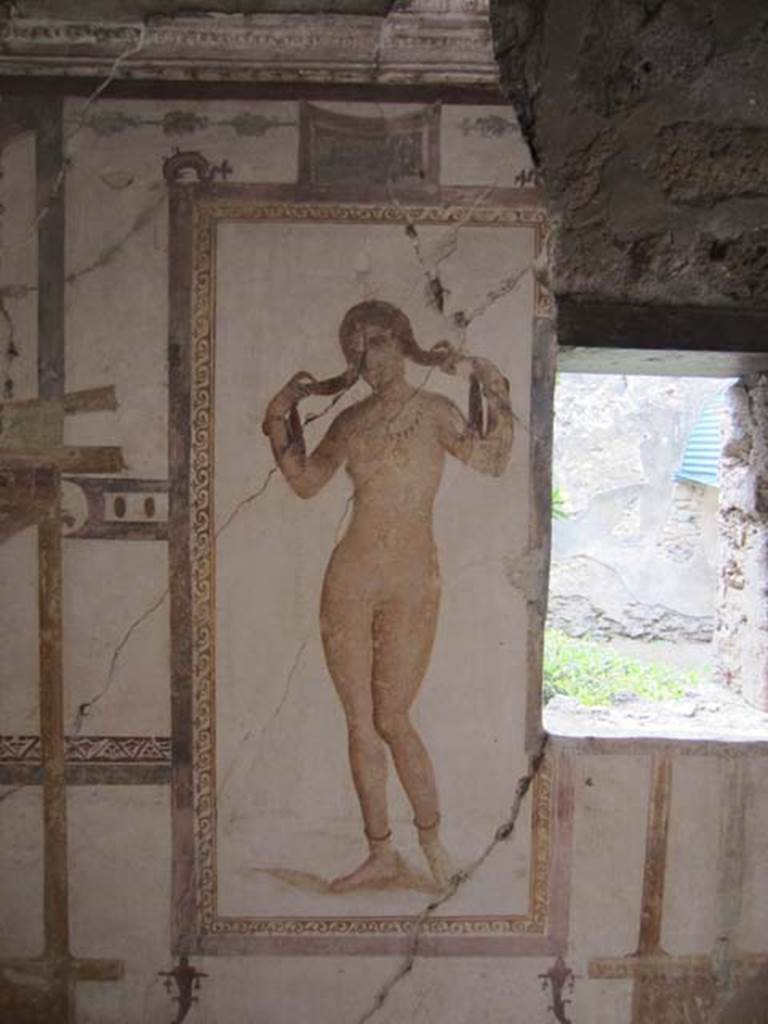 VI.15.8 Pompeii. April 2012. Fresco of female figure (Venus?) on the west wall of the summer triclinium.  Photo courtesy of Marina Fuxa.
