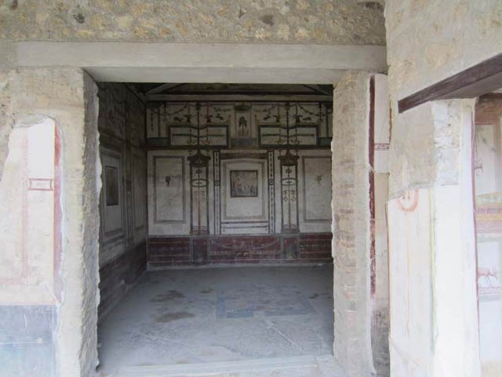 VI.15.8 Pompeii. April 2012. South-east corner of portico, with doorways to oecus, recess and summer triclinium. Photo courtesy of Marina Fuxa.

