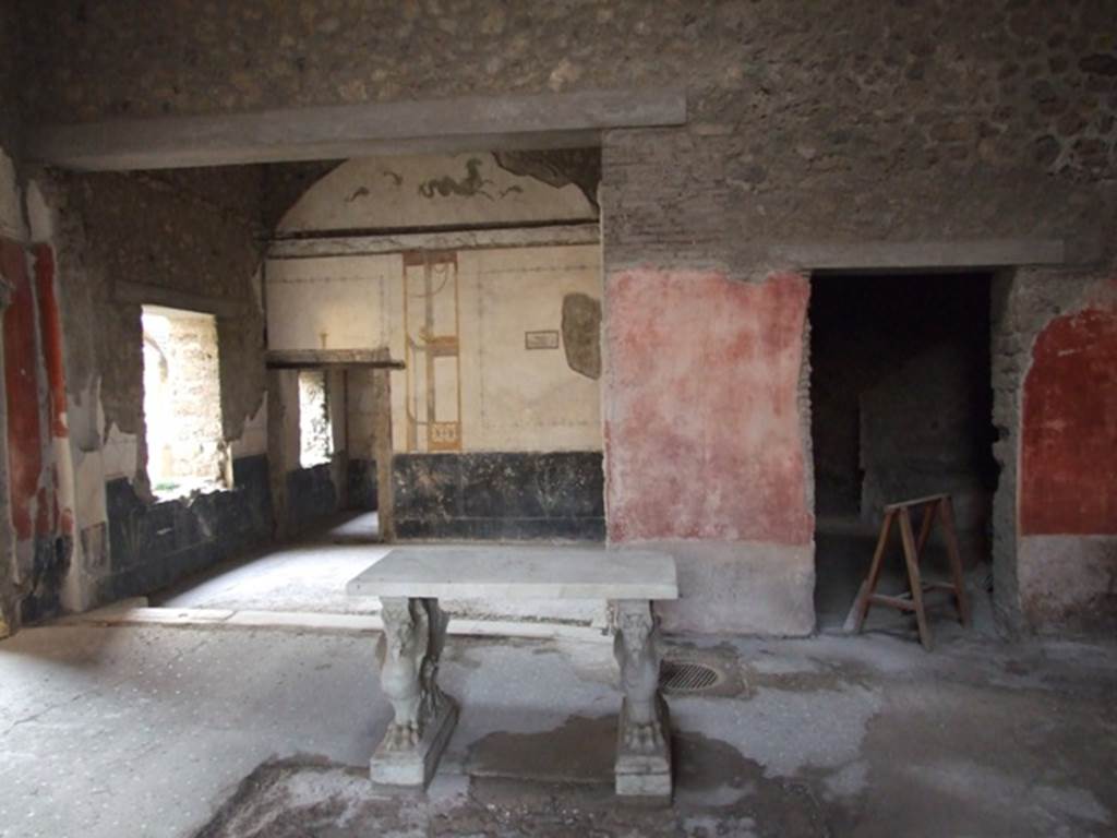 VI.15.8 Pompeii. December 2007. Looking west across atrium towards tablinum and doorway to kitchen.