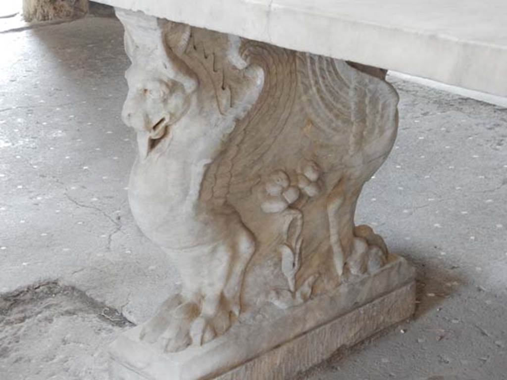 VI.15.8 Pompeii. May 2015. Marble table leg at south end. Photo courtesy of Buzz Ferebee.