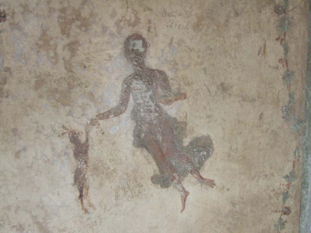 VI.16.7 Pompeii. May 2006. Room Q, painted flying figure on west wall at north end.