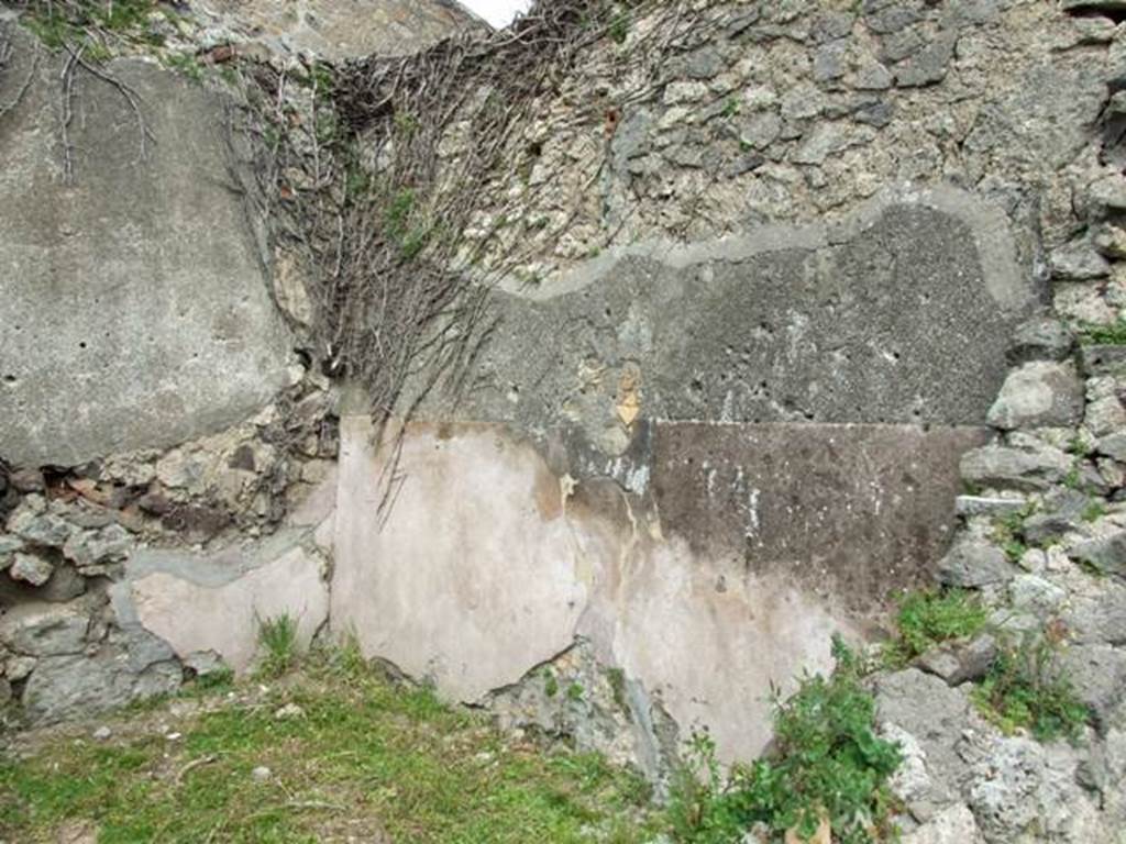 VI.16.29 Pompeii. March 2009. Room G, east wall. In the extreme left of the east wall, and high up, was a type of tufa nocerina capital of a pilaster used as a building material. According to Sogliano, this pilaster deserved the attention of scholars. See Notizie degli Scavi di Antichità, 1908, (p.282 and fig 8 on p. 283).
