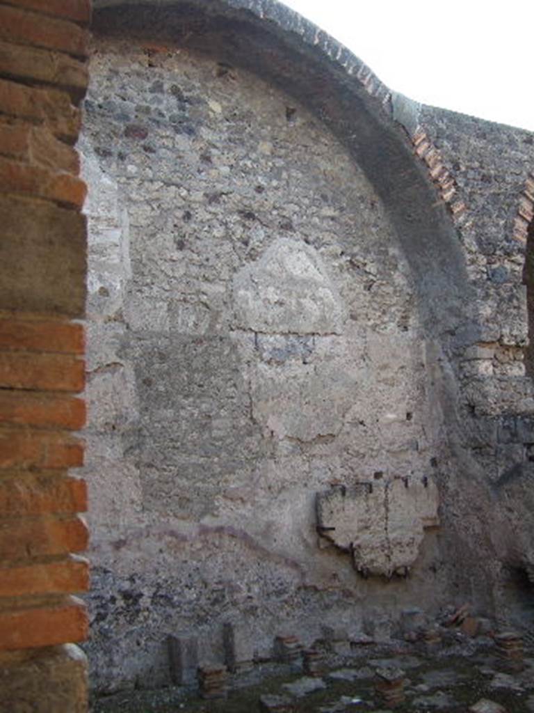VII.1.8 Pompeii. December 2006. West wall of tepidarium 3 from doorway in men’s changing room 2.