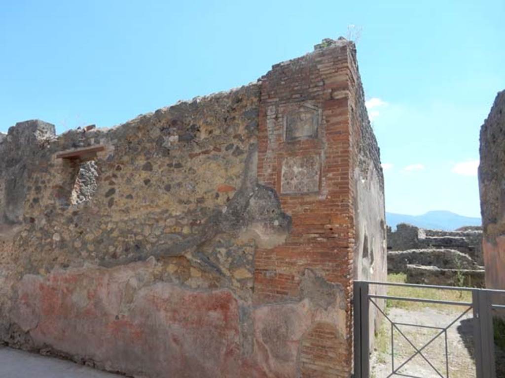 VII.1.36 Pompeii. June 2019. Plaques on east side of doorway. Photo courtesy of Buzz Ferebee.