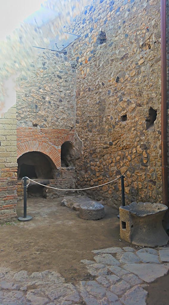 VII.1.46 Pompeii. May 2017.  
Looking north-east across kitchen/bakery area 12 towards oven.
Photo courtesy of Giuseppe Ciaramella.

