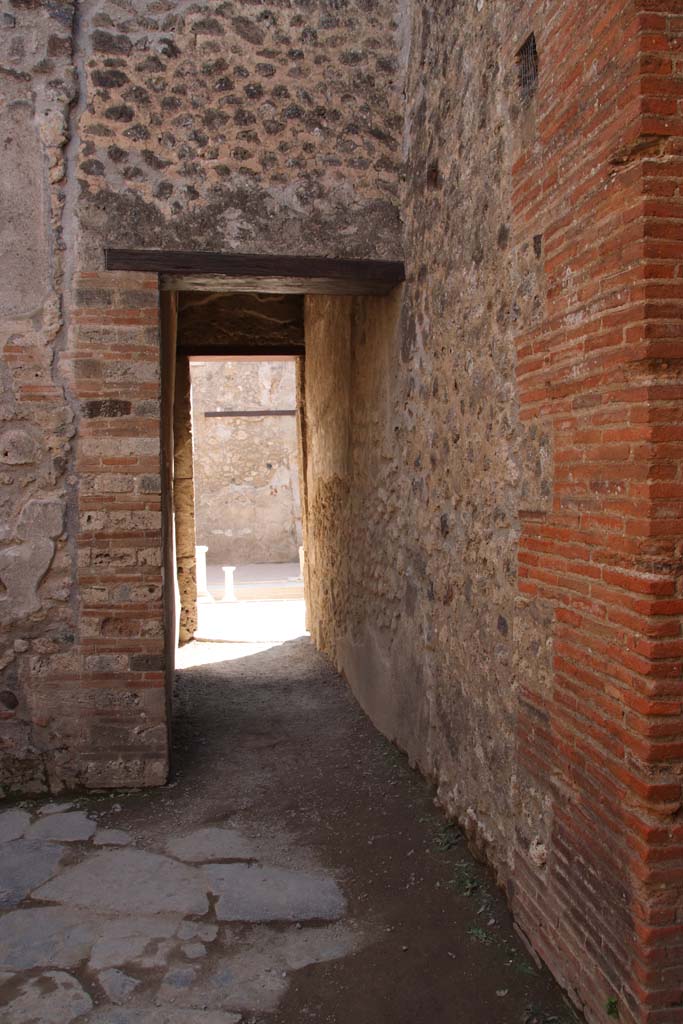 VII.1.46 Pompeii. September 2017. 
Looking south from kitchen room 12 towards corridor 9, leading to atrium.
Photo courtesy of Klaus Heese. 
