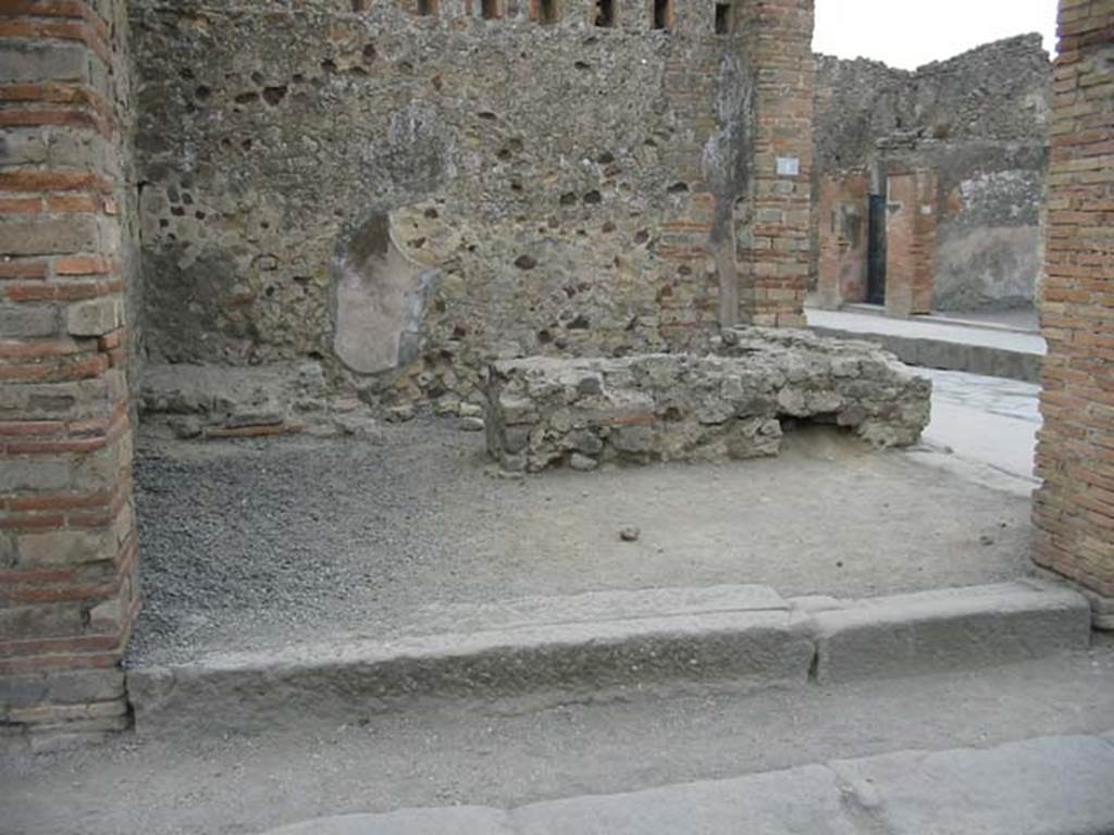 VII.1.62 Pompeii. May 2003. Entrance on corner of Vicolo del Lupanare, looking south-east towards Via dellAbbondanza, on right. Photo courtesy of Nicolas Monteix.

