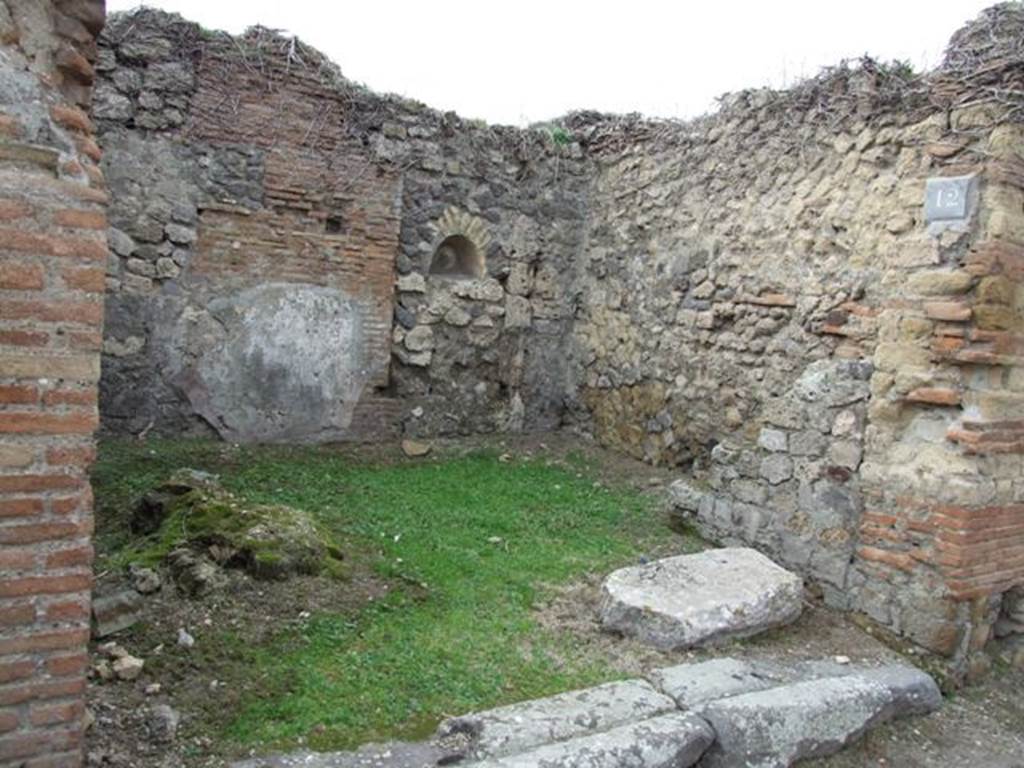 VII.2.12 Pompeii. December 2007. Looking towards west wall, north-west corner and north wall with staircase. 