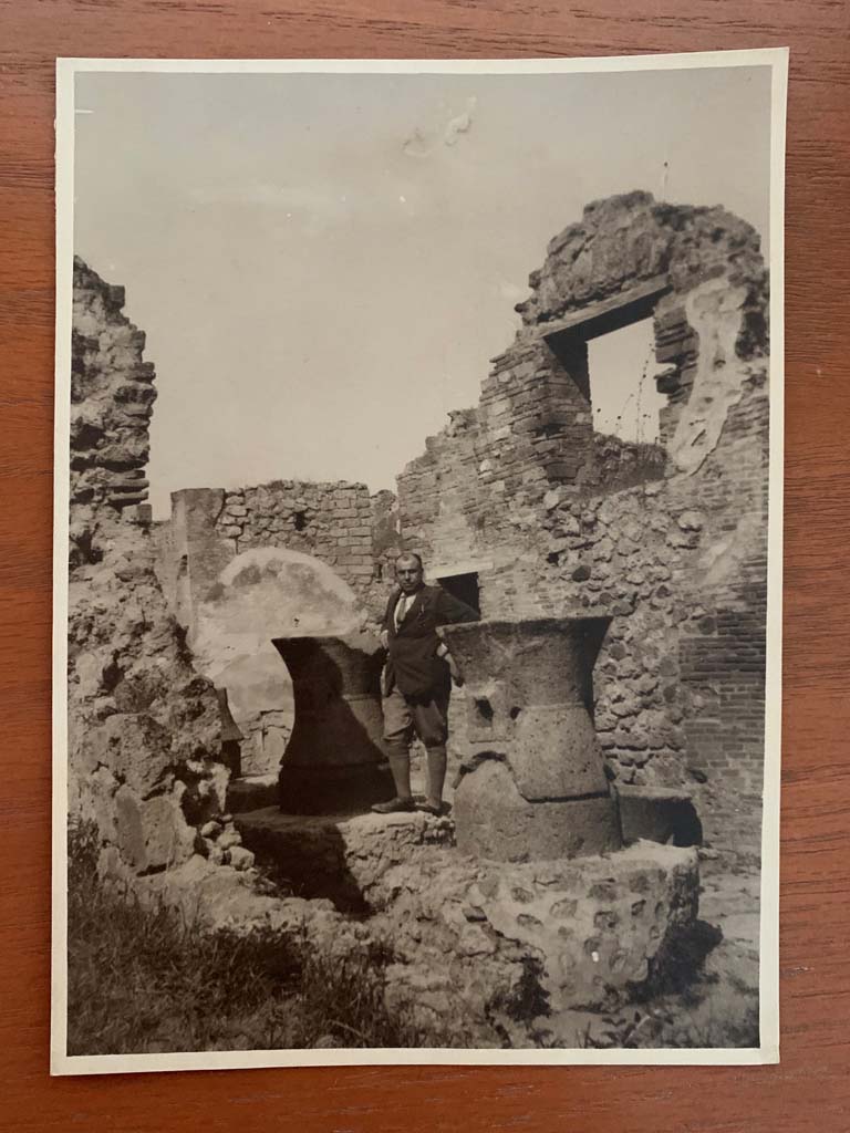 VII.2.22 Pompeii. From an album dated 1922. Looking north-west across bakery towards mills. 
Photo courtesy of Rick Bauer.
