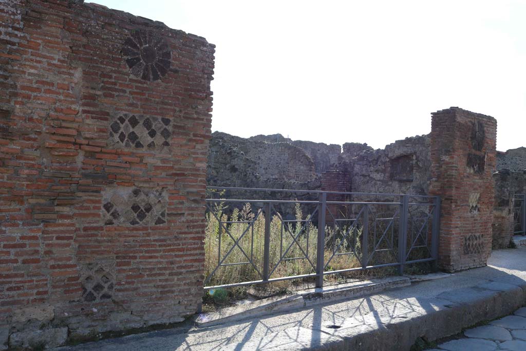 VII.3.8 Pompeii. December 2018. Looking south-west towards west wall of shop “l (L)”, and west pilaster. Photo courtesy of Aude Durand.
