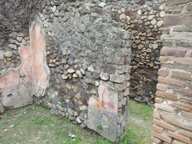 VII.3.12 Pompeii.  March 2009. West wall of rear room of shop, with doorway to corridor of VII.3.11.