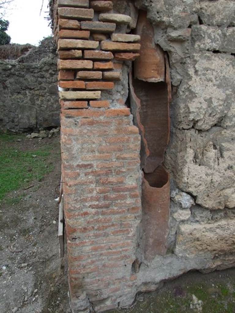 VII.3.17 Pompeii. December 2007. Waste pipe from upper floor, inside wall on north side of entrance.
