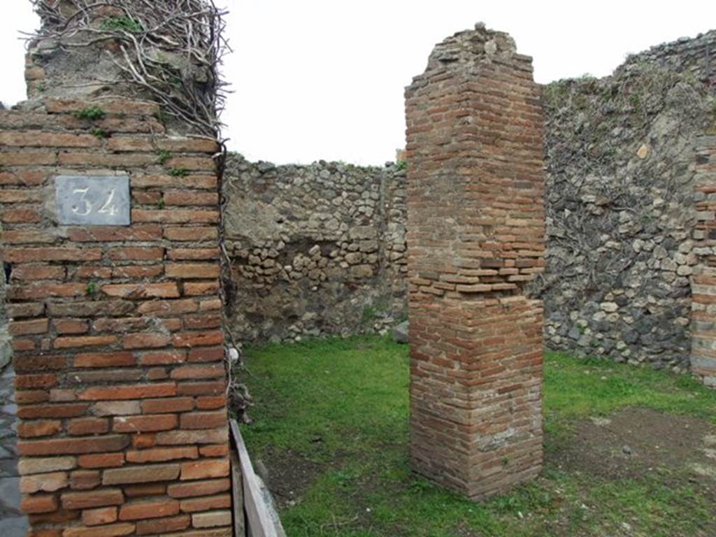 VII.3.34 Pompeii. March 2009. Looking north into room connected to VII.3.35, separated by two brick pilasters.