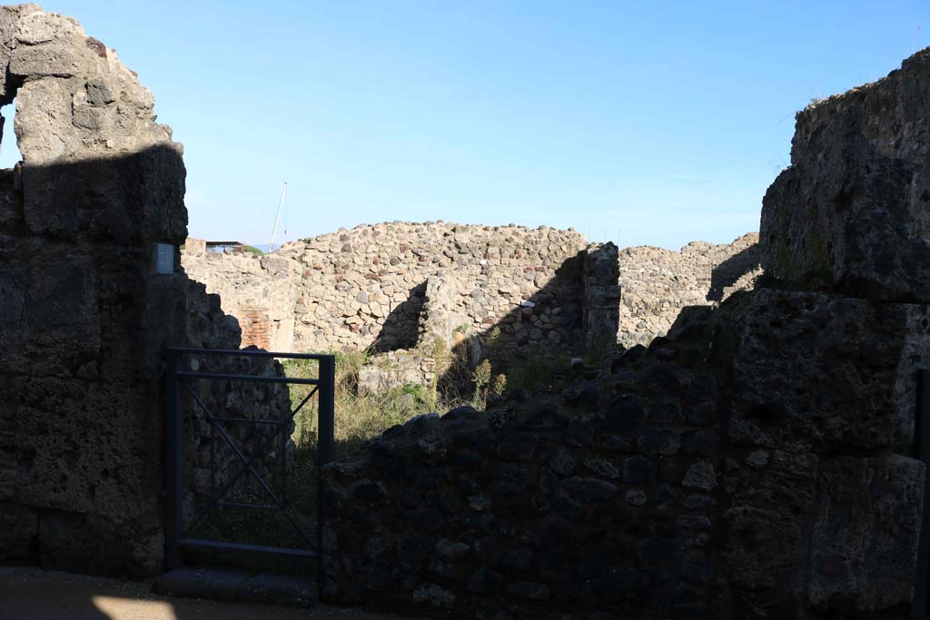 VII.3.39 Pompeii. December 2018. Looking east from entrance doorway towards two small rooms at rear of VII.3.1 and VII.3.2.