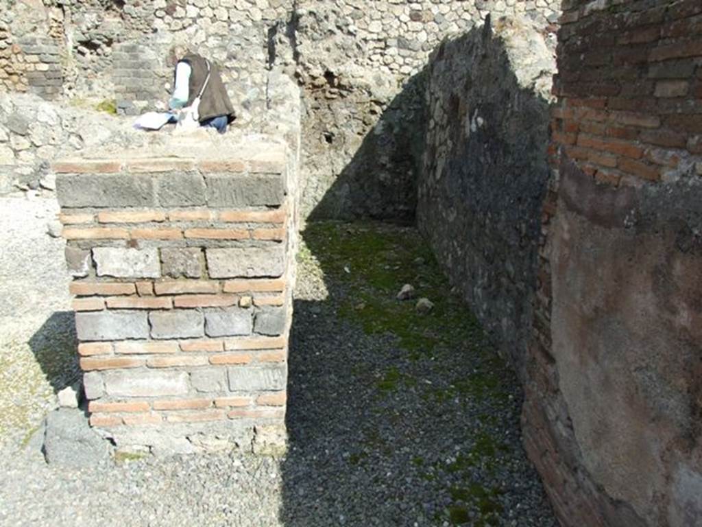 VII.4.4  Pompeii. March 2009.  Long narrow room or corridor, at east rear side of stairs to upper floor.