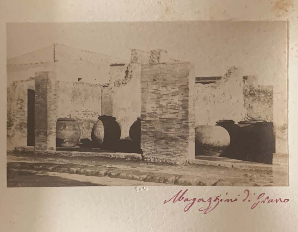 VII.4.13, in centre, and 14, on right. From an album dated c.1875-1885. Looking east across Via del Foro. 
According to the writing, this was a warehouse for flour. Photo courtesy of Rick Bauer.


