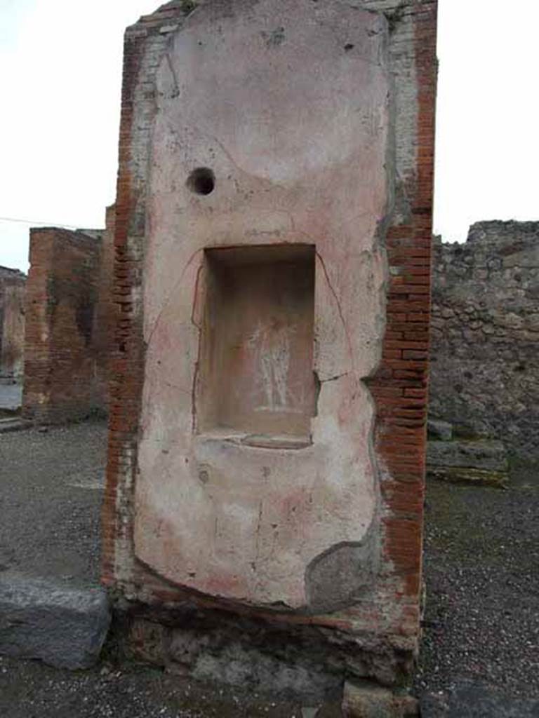 VII.4.17 Pompeii.  May 2010. Street shrine, on left pilaster.
