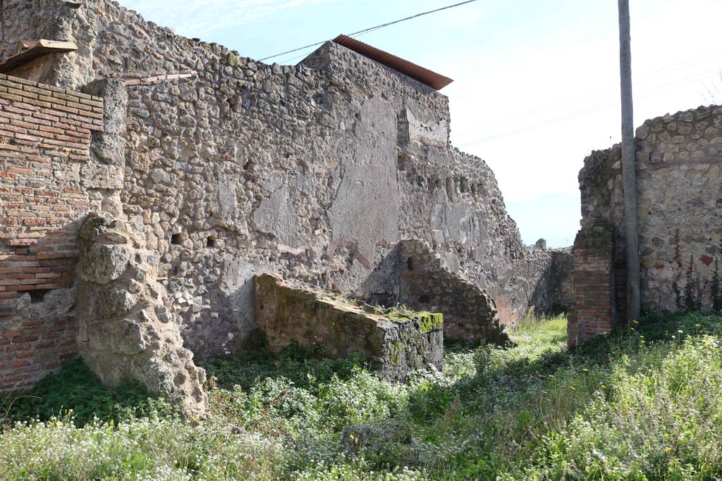 VII.4.29 Pompeii. December 2018. 
Looking towards east wall of VII.4.29, from south-east corner of VII.4.57 (?). Photo courtesy of Aude Durand.
