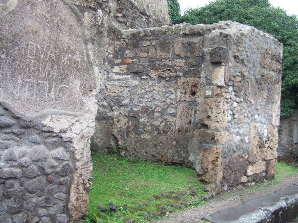 VII.4.34 Pompeii. December 2005. Entrance and north wall of shop.