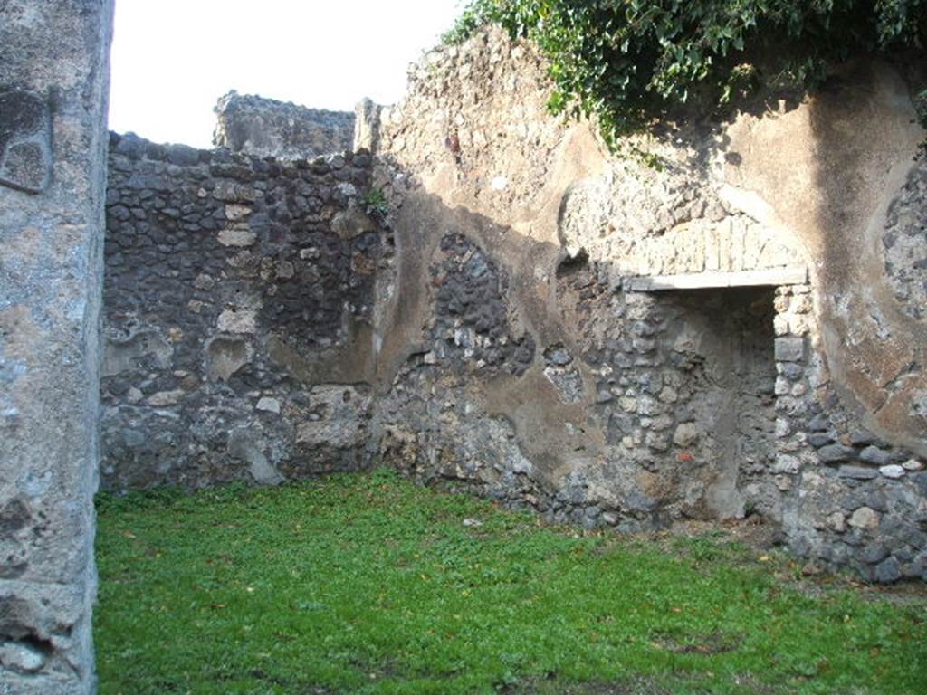 VII.4.38 Pompeii. May 2006. North wall, with cupboard or recess built into wall.