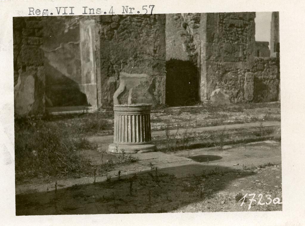 VII.4.57 Pompeii. Pre-1937-39. 
Looking across impluvium in atrium towards doorways to rooms on west side of atrium. Room 10, on left, and room 11, on right.
Photo courtesy of American Academy in Rome, Photographic Archive. Warsher collection no. 1723.

