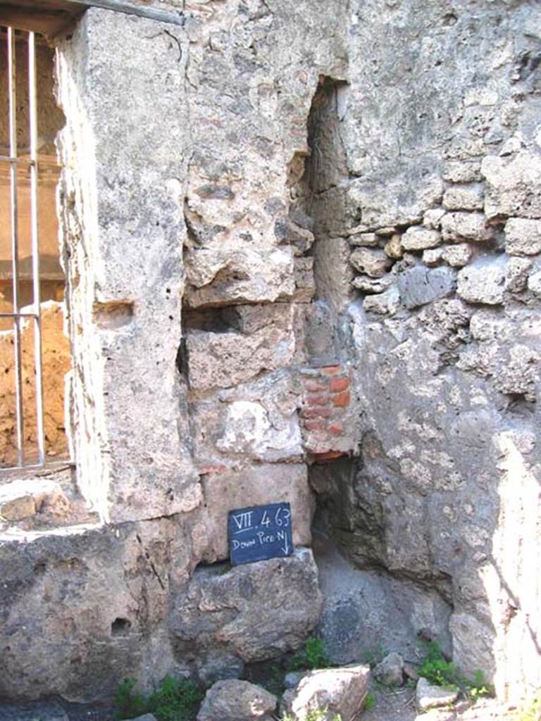 VII.4.63 Pompeii. July 2008. South-west corner with downpipe. Photo courtesy of Barry Hobson.